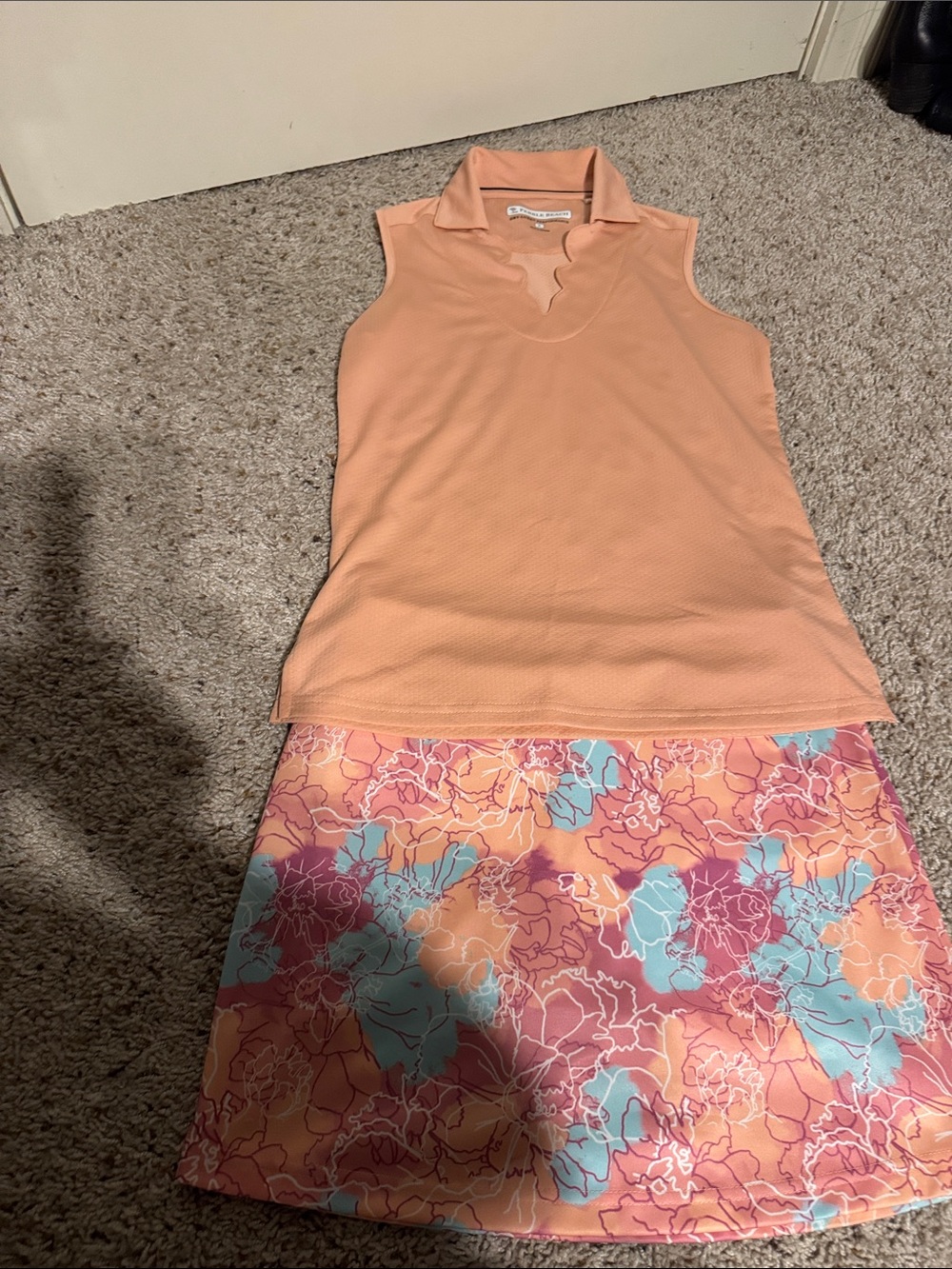 Pebble Beach Peach Sleeveless Polo with Floral Peach-Blue Skirt